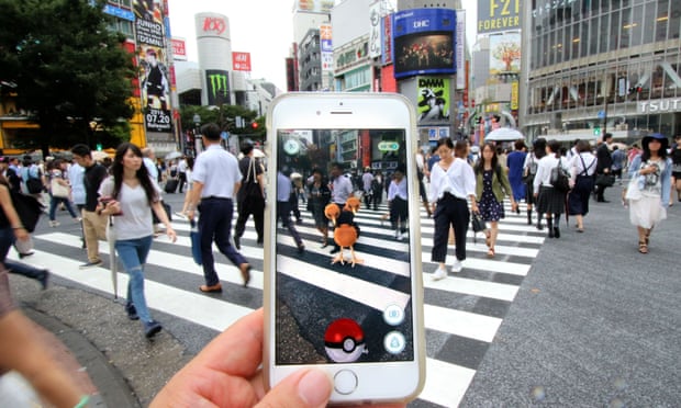 A Pokemon Go! player hunts Pokemon in Tokyo, Japan.