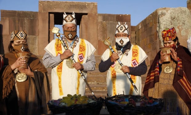 Bolivia’s president Luis Arce, second left, and vice-president David Choquehuanca, during a ceremony at the pre-Inca site of Tiwanaku.