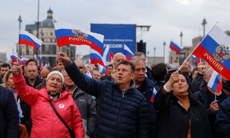 People attend a concert marking the declared annexation of the Russian-controlled territories of four Ukraine's Donetsk, Luhansk, Kherson and Zaporizhzhia regions.