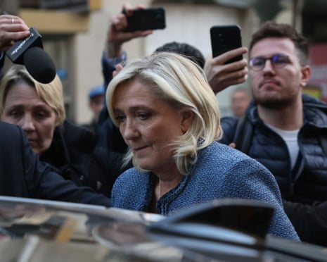 French far-right leader Marine Le Pen leaves the National Rally headquarters after a French court convicted Marine Le Pen of embezzlement and barred her from seeking public office for five years in March last year.