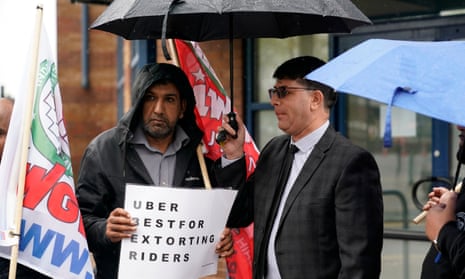 Uber drivers protest outside Uber offices in Birmingham.