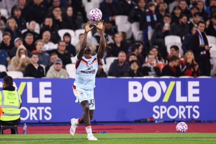 Brentford’s Michael Kayode launches a throw-in against West Ham