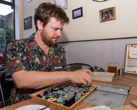 Tim Stone working on his Lego Nintendo Game Boy console.