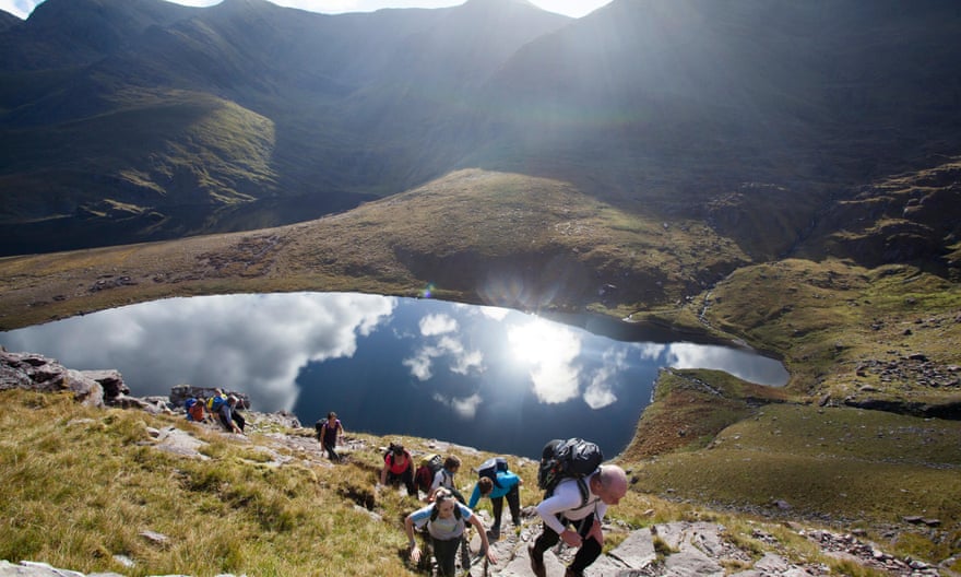 Walkers above Lough Gouragh on the ascent of Carrauntoohill