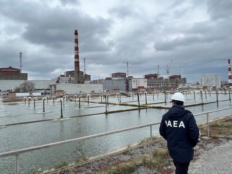 A file photo of a member of the International Atomic Energy Agency (IAEA) expert mission touring the Zaporizhzhia nuclear power plant in March of this year.