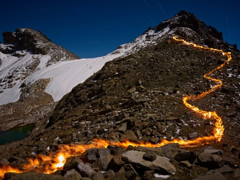 The Lewis Glacier, Mt Kenya by Simon Norfolk. The line of fire shows where the glacier used to extend to.