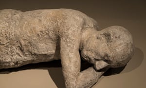 TORONTO, ONTARIO, CANADA - 2015/08/21: Plaster cast body of a man killed by the eruption of Mount Vesuvius at Pompeii in 79 A.D on display at the Royal Ontario Museum. The man is lying on the floor sideways with his hand under his head. The city of Pompeii was an ancient Roman town in Italy which was mostly destroyed and buried under ash and pumice in the eruption of Mount Vesuvius in 79 AD. (Photo by Roberto Machado Noa/LightRocket via Getty Images)
