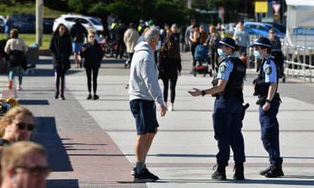 NSW police the promenade at Bondi Beach on 20 July during the Covid lockdown of greater Sydney.