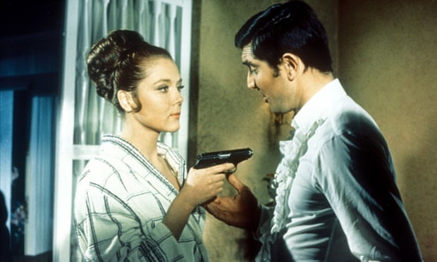 George Lazenby and Diana Rigg.