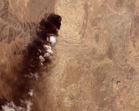 A satellite image shows smoke billowing from an Aramco oil depot near the Saudi city of Abha after a Houthi attack. A satellite image shows smoke billowing from an Aramco oil depot near the Saudi city of Abha after a Houthi attack.