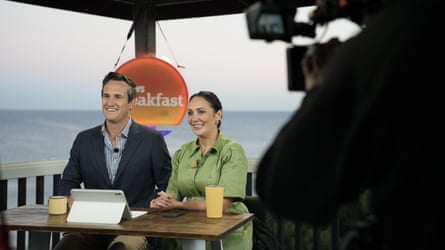 James Glenday and Bridget Brennan at a table overlooking the ocean