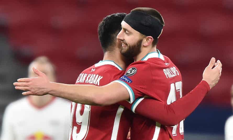 Nathaniel Phillips and Ozan Kabak celebrate a win and a clean sheet against Leipzig.