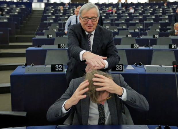 EU president Jean-Claude Juncker jokes with Verhofstadt in Strasbourg.
