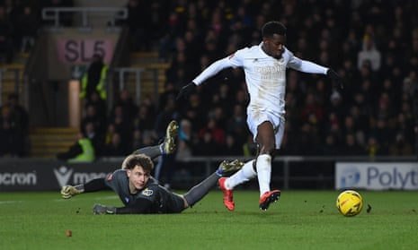 Eddie Nketiah rounds Oxford United’s Eddie McGinty to make it 2-0.