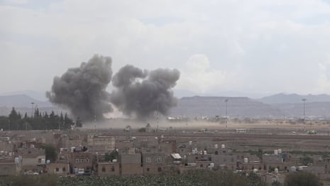 Smoke rises after airstrikes on Sanaa international airport in Yemen.