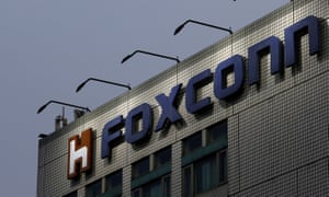 FILE PHOTO: The logo of Foxconn, the trading name of Hon Hai Precision Industry, is seen on top of the company’s headquarters in New Taipei City, Taiwan March 29, 2016. REUTERS/Tyrone Siu/File Photo