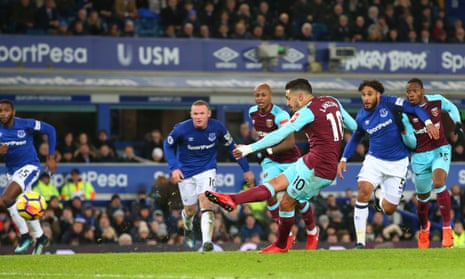 Manuel Lanzini of West Ham United takes a penalty that is saved by Jordan Pickford.
