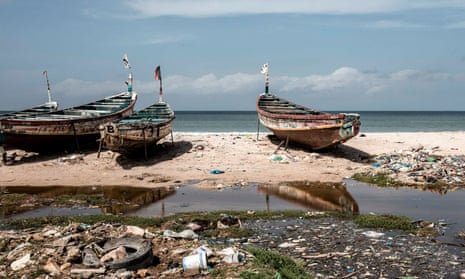 Fishing boats on an African shoreline