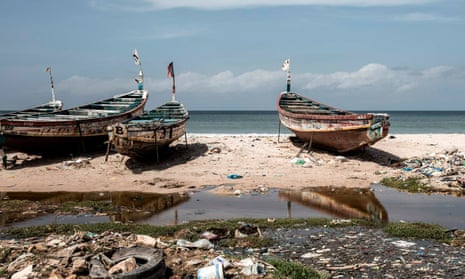 Fishing boats along a shoreline in Africa