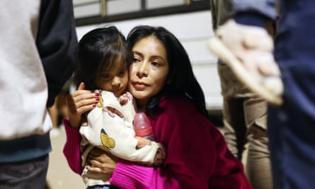 A Peruvian family at the border in Yuma, Arizona on Thursday.