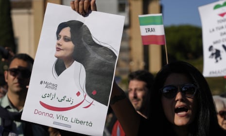 People stage a protest against the death of Mahsa Amini, a woman who died while in police custody in Iran