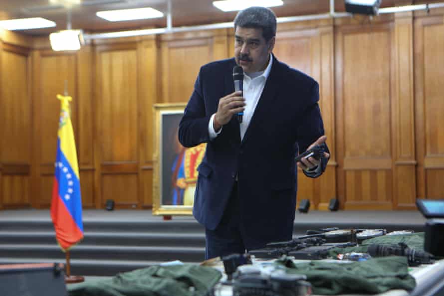 Venezuelan President, Nicolas Maduro displays seized armament and passports after a meeting with members of the Armed Forces in Caracas, Venezuela on May 4, 2020. Maduro confirmed the detention of two US mercenaries among 13 attackers involved in Sunday’s two failed maritime raids.