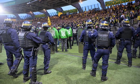 Riot police at a match between FC Nantes and RC Strasbourg Alsace in Nantes, France, 16 March 2024.