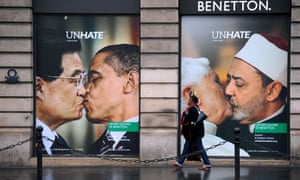 A Benetton clothing store in 2011 covered by posters showing Pope Benedict XVI kissing Egypt’s Ahmed el Tayyeb, imam of the Al-Azhar mosque in Cairo, and US president Barack Obama.