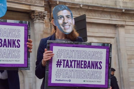 Protest against interest rate hikes outside Bank of England, London, UK - 21 Sep 2023Mandatory Credit: Photo by Vuk Valcic/ZUMA Press Wire/Shutterstock (14114510b) Activists from the group Positive Money donning masks of Rishi Sunak, BOE Governor Andrew Bailey and various banks stage a protest against interest rate hikes and profiteering outside the Bank of England. Protest against interest rate hikes outside Bank of England, London, UK - 21 Sep 2023