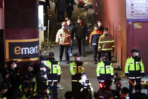 Rescue workers in alleyway