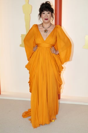 Sandra Oh wore a Grecian-style gown by Giambattista Valli. Orange is an unusual red carpet colour but in these champagne-hued times, a welcome one.