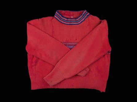 The red knitted jumper given to Jochewet Heidenstein by her parents before she left Berlin for Britain.