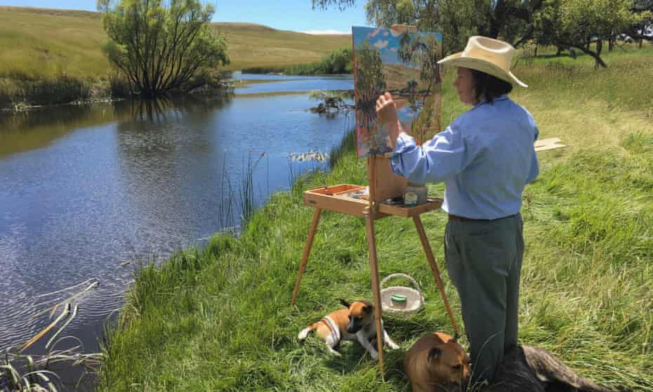 Lucy Culliton at work in the Monaro in southern NSW accompanied by her dogs.