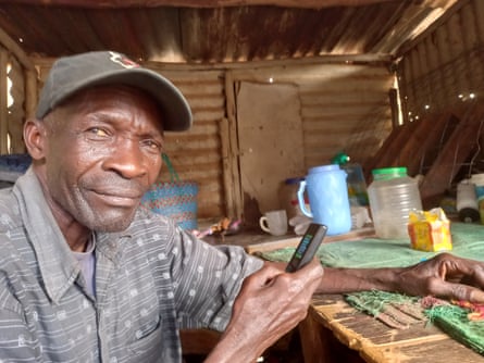 Florencio Okonyo at his grocery stall in Kibera, Nairobi