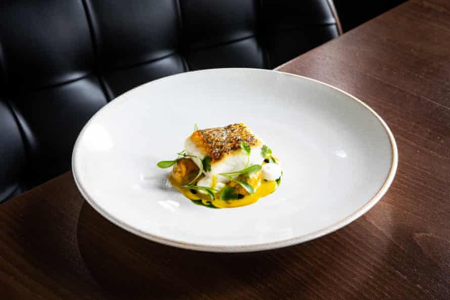 Tallow’s starter of hake, ‘sitting in a heavenly puddle of rather elegant curry sauce’.
