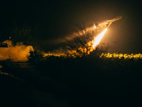 A FP-2 drone launches into the night sky