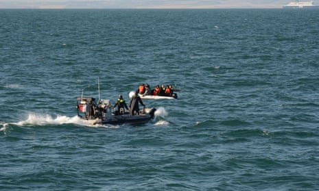 French authorities go to rescue of migrants whose boat capsized in the Channel.