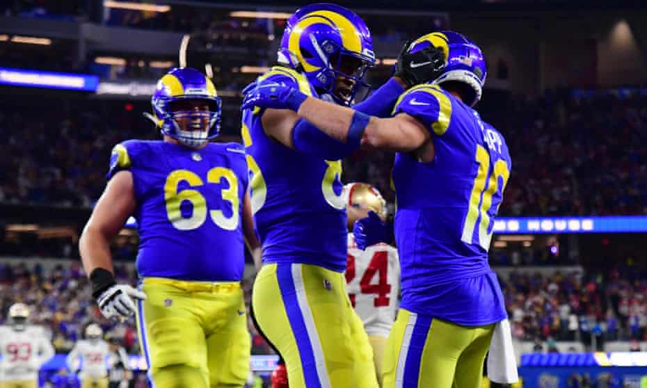 Los Angeles Rams wide receiver Cooper Kupp (10) celebrates with teammates after catching a touchdown pass against the San Francisco 49ers in the second half during the NFC Championship Game