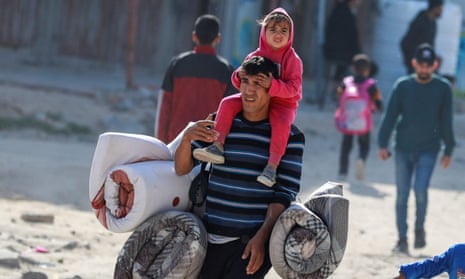 Palestinians flee Beit Lahiya in the northern Gaza Strip.