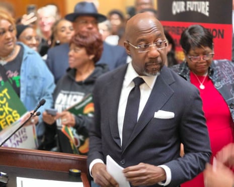 Raphael Warnock speaks at the Georgia state capitol.