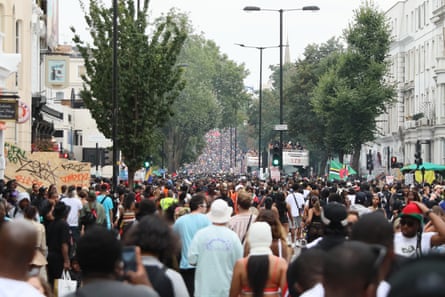 Huge crowds walk through Notting Hill carnival