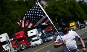 Truckers protest low rates and lack of broker transparency during the coronavirus pandemic along Constitution Avenue