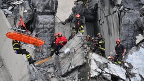 Genoa bridge collapse: rescuers search for survivors – video report