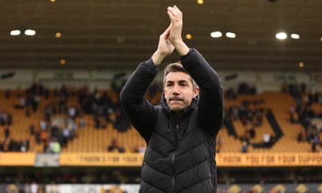 Bruno Lage applauds the home fans at Molineux
