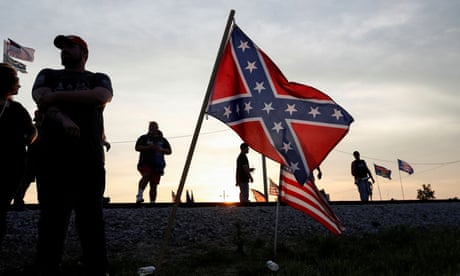Former U.S. President Trump holds a rally in Wellington, OH<br>Supporters of former U.S. President Donald Trump stand near Confederate and U.S. flags as they gather for his first post-presidency campaign rally at the Lorain County Fairgrounds in Wellington, Ohio, U.S., June 26, 2021. REUTERS/Shannon Stapleton TPX IMAGES OF THE DAY