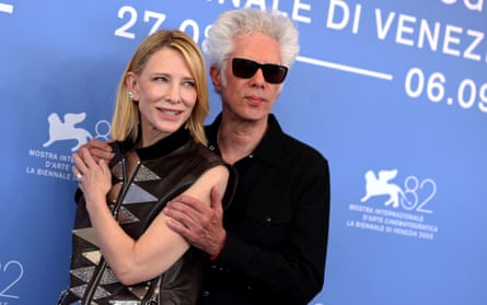 Cate Blanchett and Jim Jarmusch posing at a photo call
