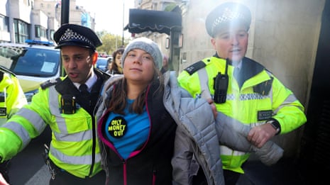 Greta Thunberg arrested after joining hundreds of climate protesters in London – video