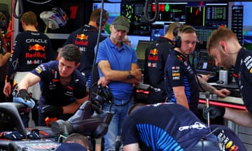 Adrian Newey, Red Bull Racing Chief Technical Officer, watches mechanics with the Red Bull Racing RB20. during pre-season testing at Sakir, Bahrain in February 2024.