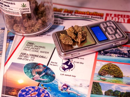 Cannabis buds on a small digital scale