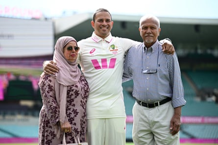 Usman Khawaja poses with his parents at the SCG